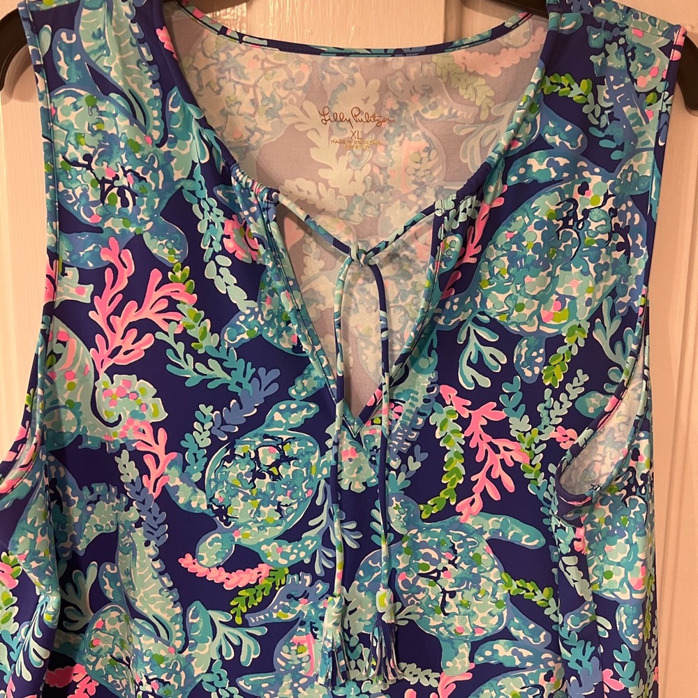 NWOT Lilly dress with pockets , sleeveless XL rayon and spandex .